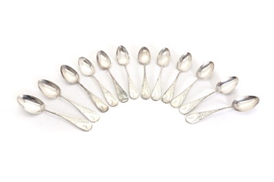 Lot 34 - A set of twelve silver spoons