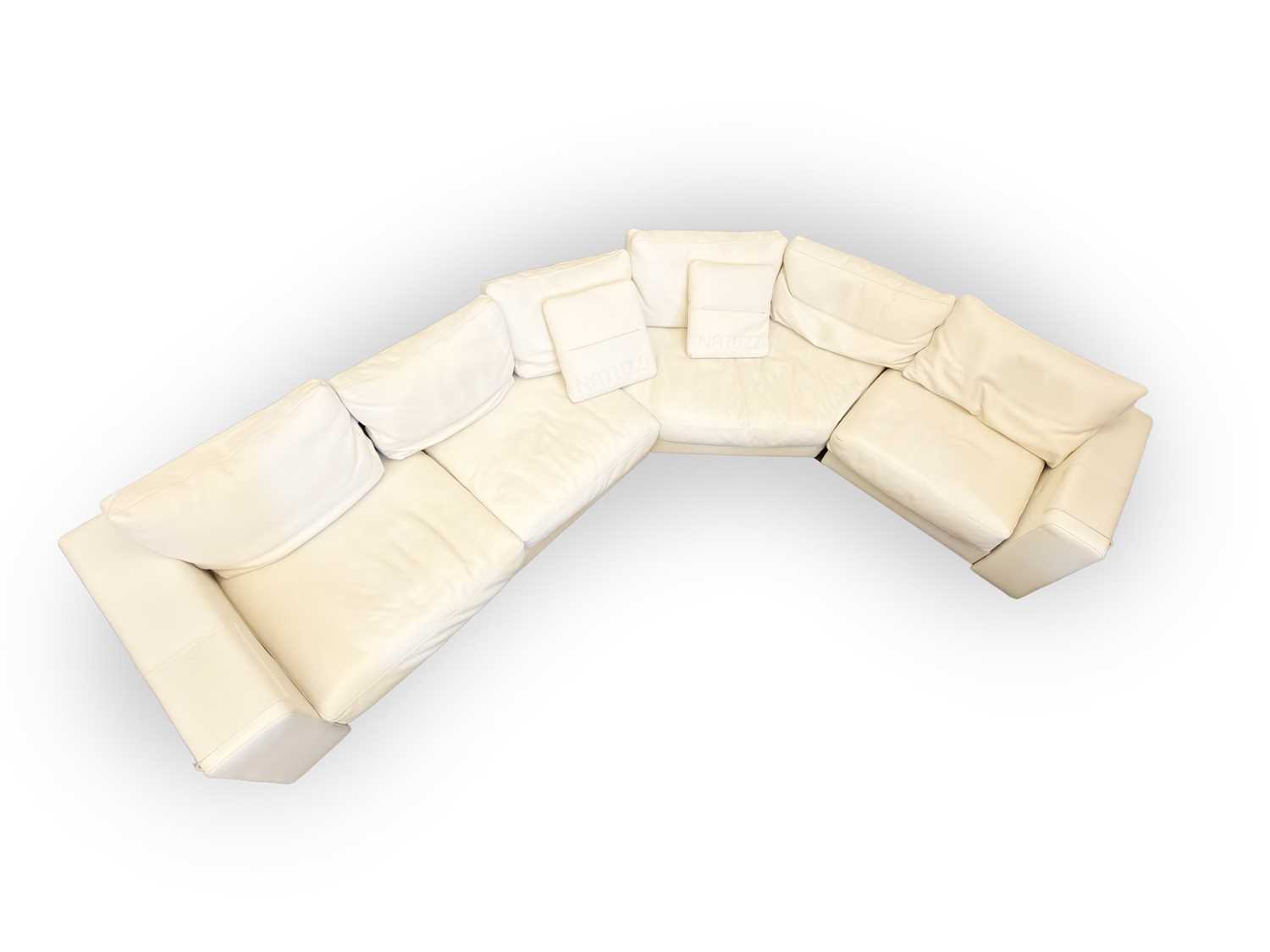 Lot 502 - A Natuzzi leather corner sofa