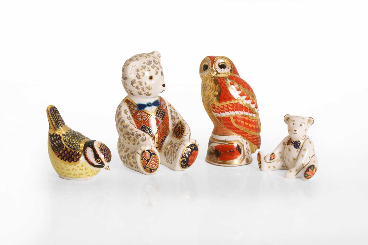 Lot 103 - A collection of Crown Derby Imari style porcelain animal paperweights