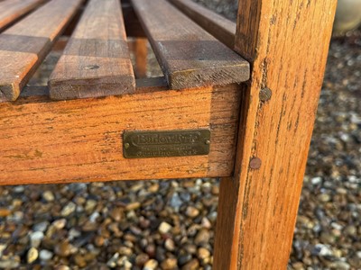 Lot 554 - A teak bench