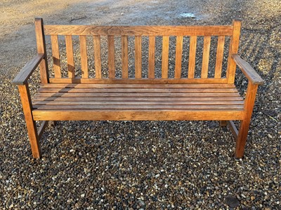 Lot 554 - A teak bench