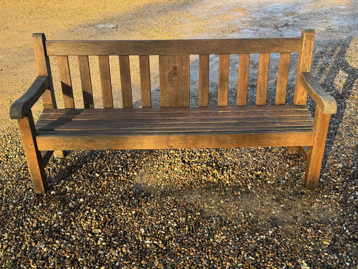 Lot 552 - A wooden garden bench