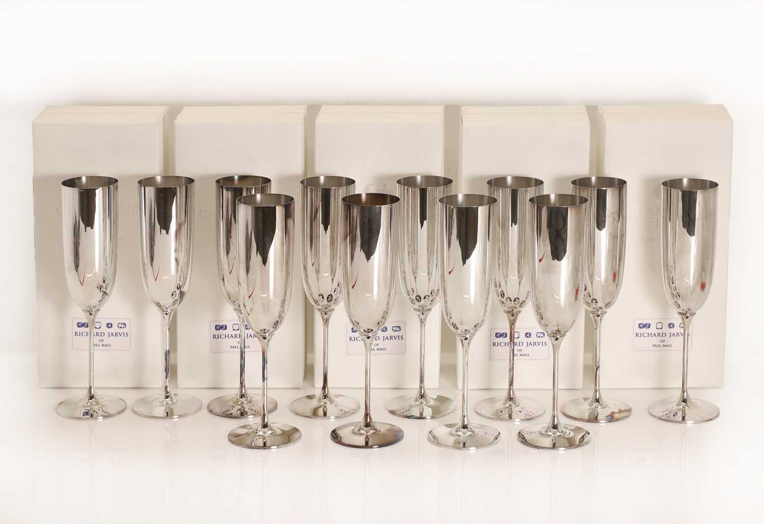 Lot 5 - A collection of twelve silver champagne flutes