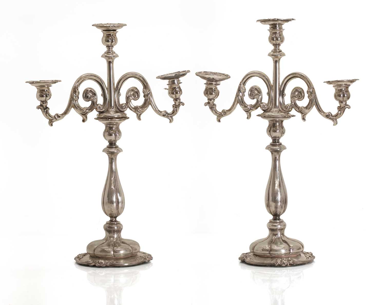 Lot 7 - A pair of Dutch .833 standard silver candlesticks