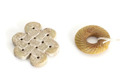 Lot 56 - Two jade pendants