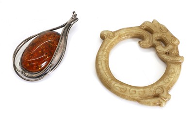 Lot 57 - A jade dragon pendant